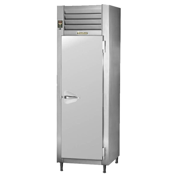 A Traulsen stainless steel reach-in refrigerator with a solid door.