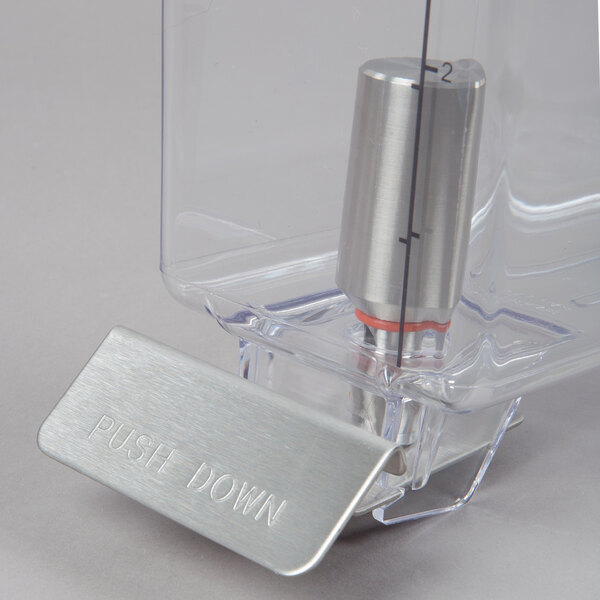 A Crathco double refrigerated beverage dispenser bowl with clear plastic cylinders and a metal plate.