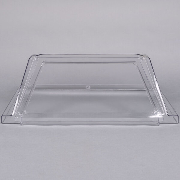 A clear plastic sneeze guard for a Grand Slam hot dog roller grill.