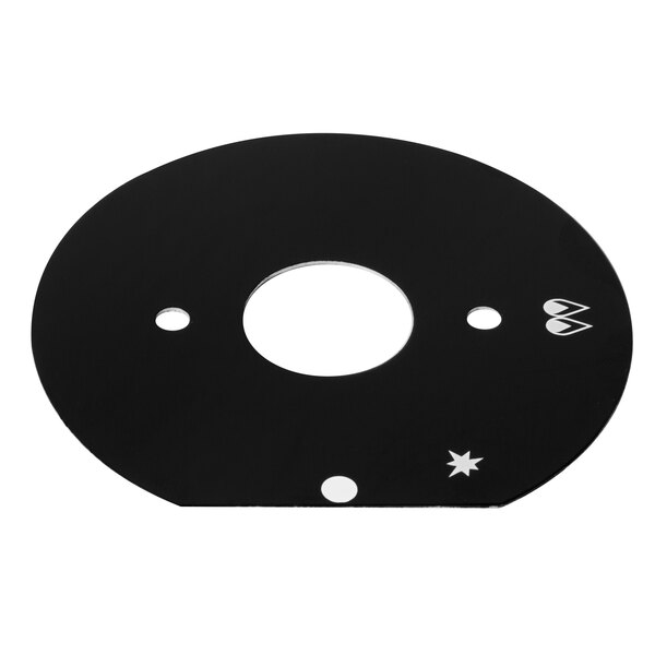 A black circular plate with a white circle and holes in it.