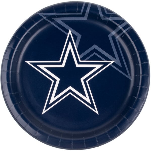A blue Creative Converting paper dinner plate with a star design and the Dallas Cowboys logo.