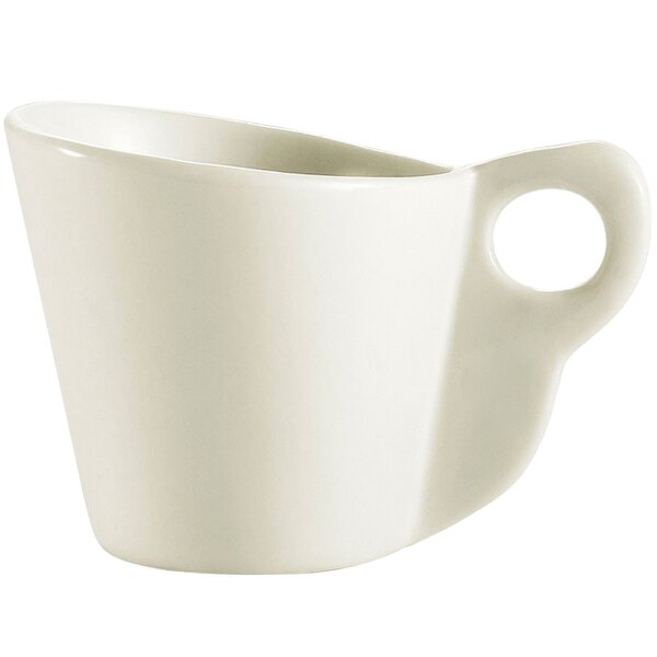 A CAC Soho ivory stoneware coffee cup with a handle.