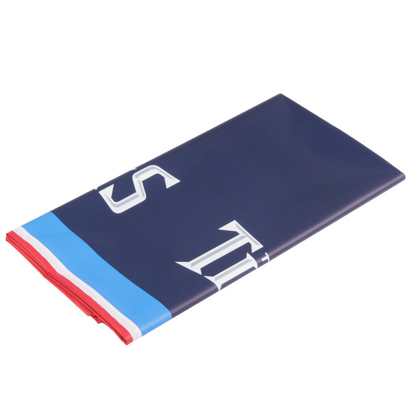 A white rectangular table cover with blue and red Tennessee Titans logos.