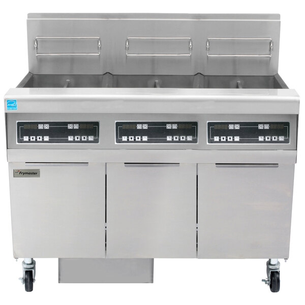 A large stainless steel Frymaster gas floor fryer system with three drawers.