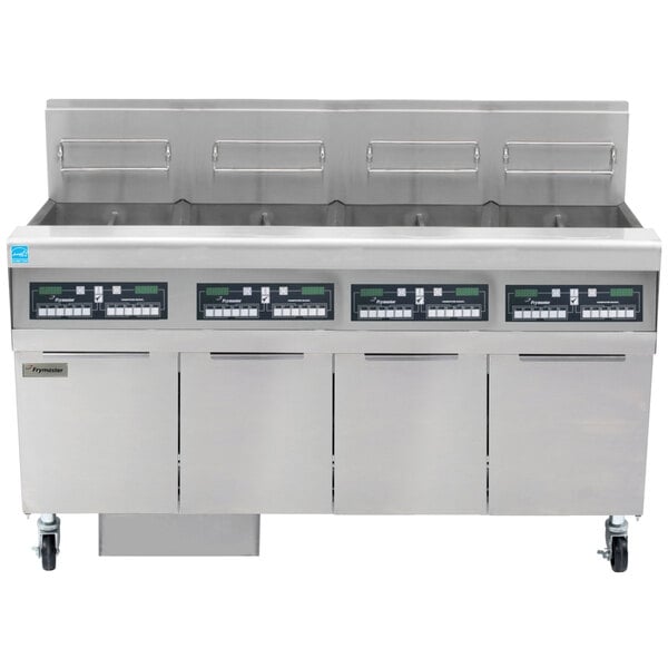 A Frymaster liquid propane gas floor fryer system with four units.