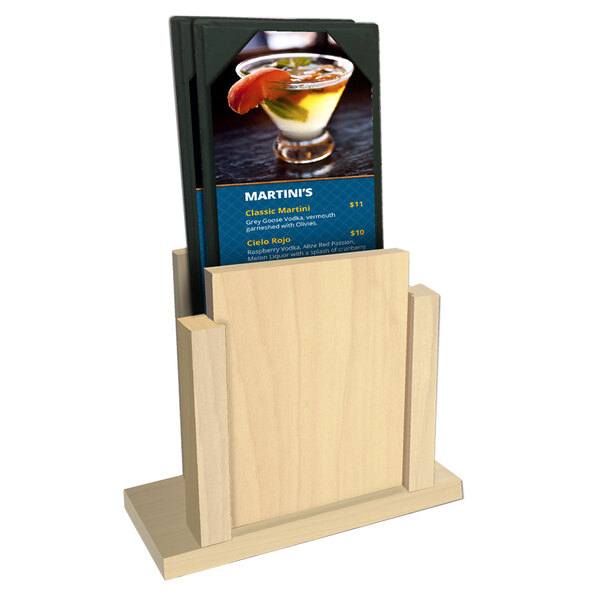 A Menu Solutions natural wood menu holder on a table with menus in it.