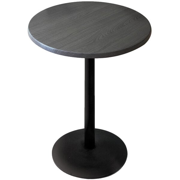 A Holland Bar Stool round outdoor bar height table with a black metal base.