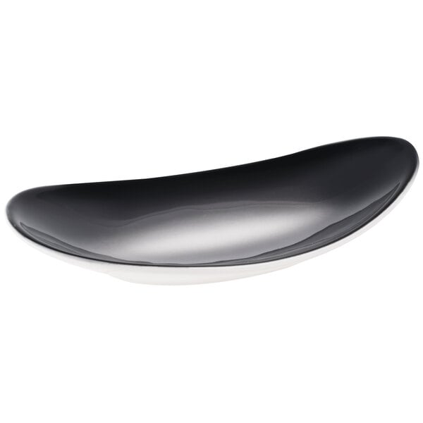 A black and white porcelain tray with a pebble design.