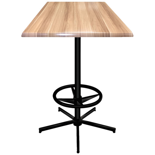 A Holland Bar Stool natural wood square bar table with a black metal base.