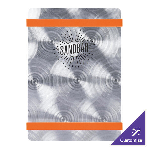 A Menu Solutions Alumitique aluminum menu board with silver and orange bands on a counter.