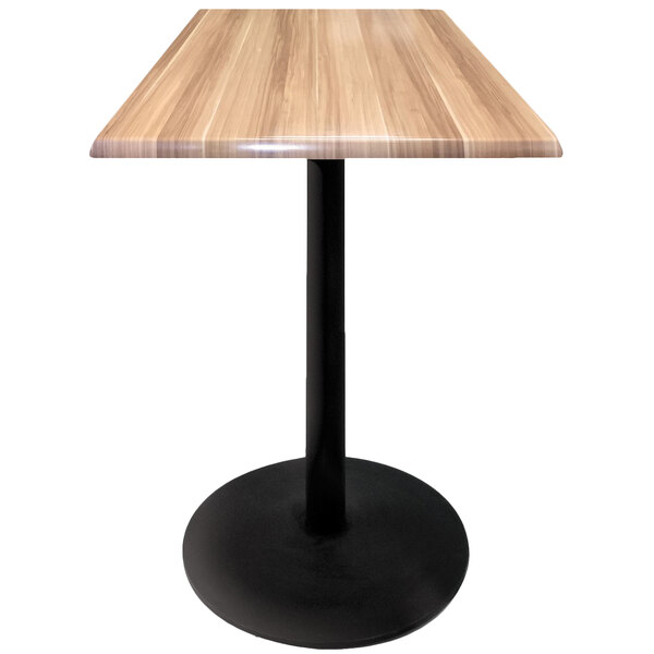 A Holland Bar Stool natural wood table with a black base.