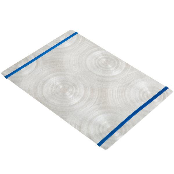 A white rectangular object with a blue band.