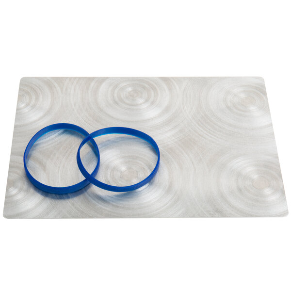 A silver aluminum menu board with navy blue rubber bands.