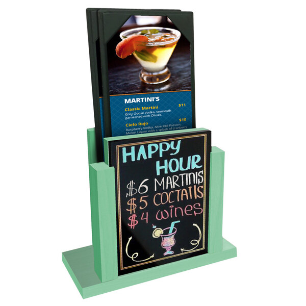 A Menu Solutions teal wood menu holder with a wet erase board insert on a counter with a cocktail.