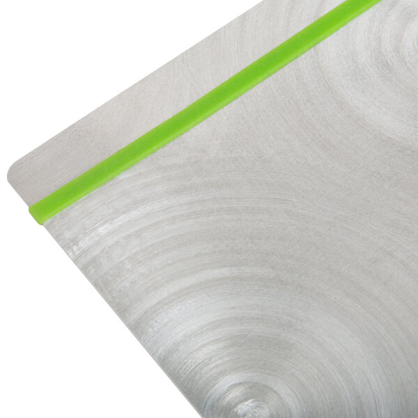 A Menu Solutions Alumitique aluminum menu board with green bands on a table.