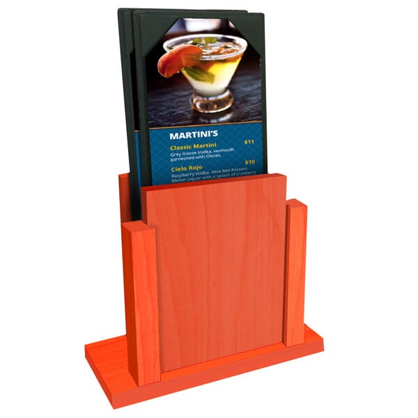 A Menu Solutions wooden holder with a drink menu on a table.