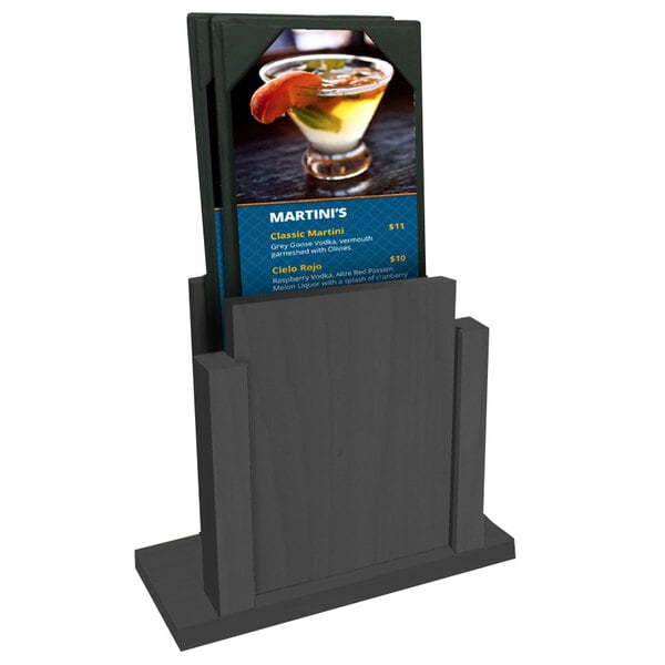 An ash wood Menu Solutions table tent holding a menu on a counter.