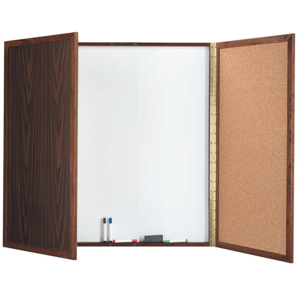 An Aarco walnut laminate planning board with white and cork boards inside.