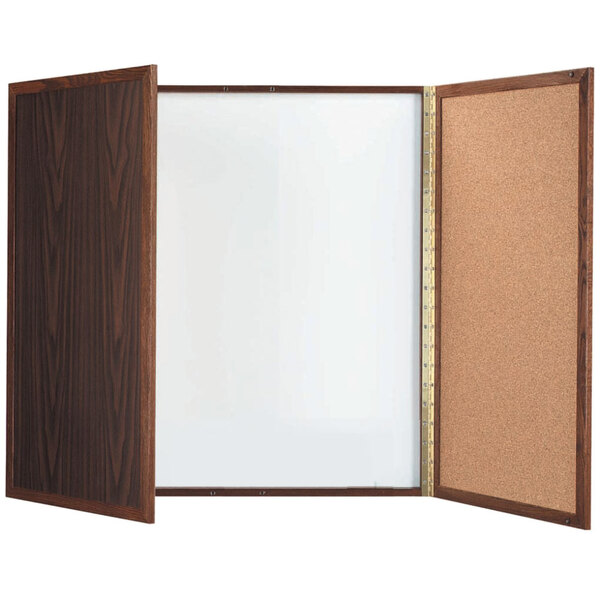 A wooden box with a white board and cork board inside.