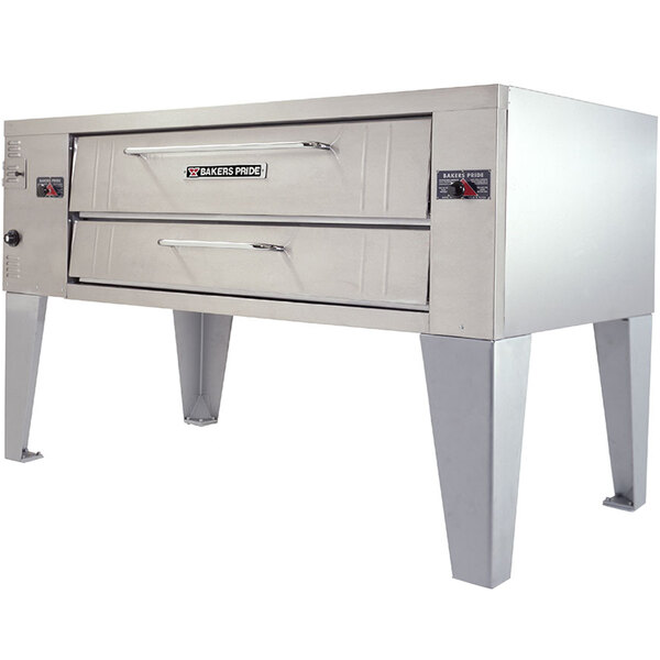 A large stainless steel Bakers Pride Y-800 pizza oven with two doors.