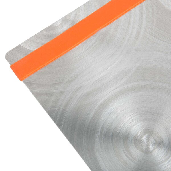 A Menu Solutions Alumitique menu board with orange bands on a table.