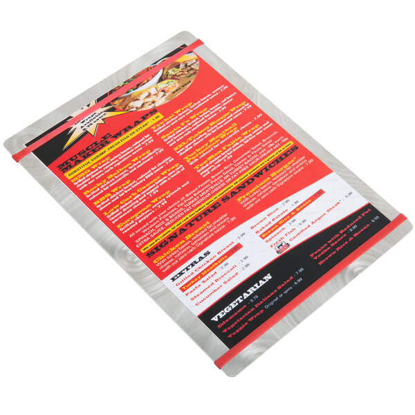 A Menu Solutions Alumitique menu board with red and black swirls on a white background.