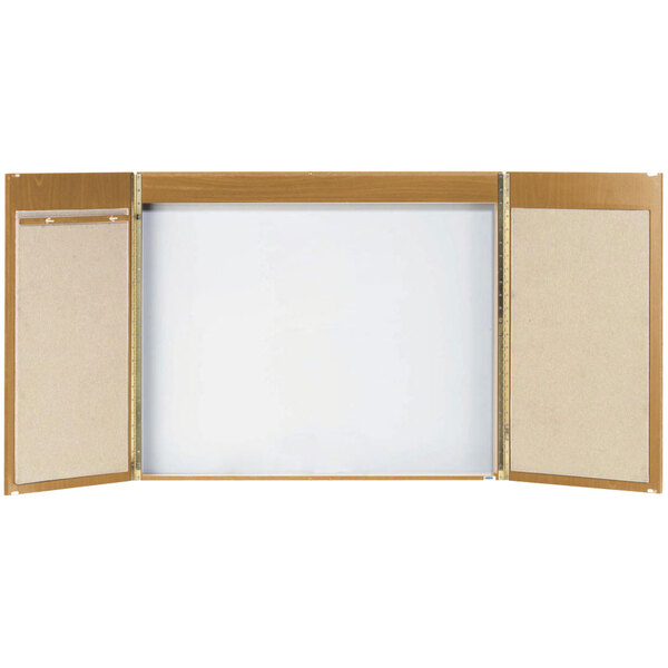 A wooden cabinet with an oak laminate white board on it.