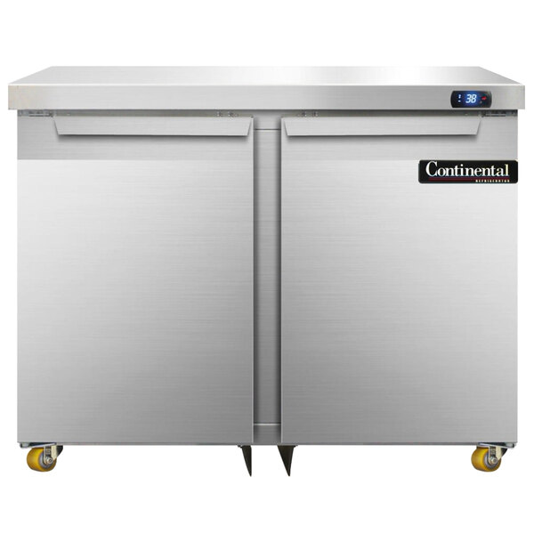 A large stainless steel Continental undercounter freezer with two doors.