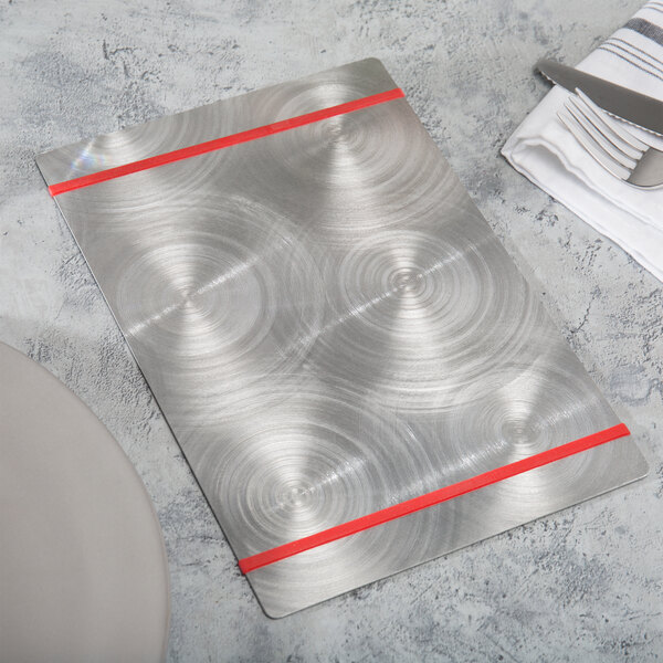 A Menu Solutions Alumitique aluminum menu board with red bands.