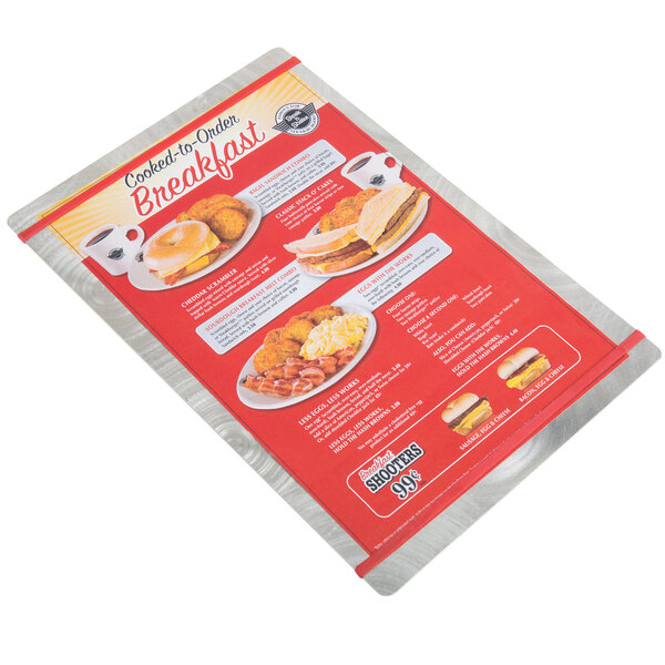 A Menu Solutions Alumitique menu board with red bands on a table with a breakfast menu in it.