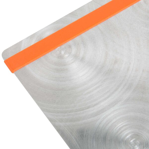 An Alumitique aluminum menu board with orange bands on a table.