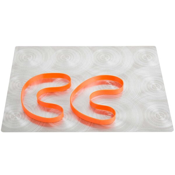 An Alumitique menu board with orange rubber bands.