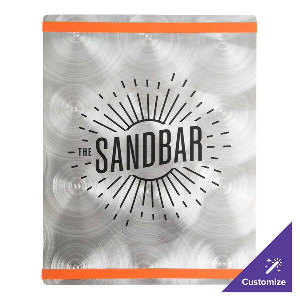 A silver metal Menu Solutions Alumitique menu board with orange bands and black text on a metal surface.