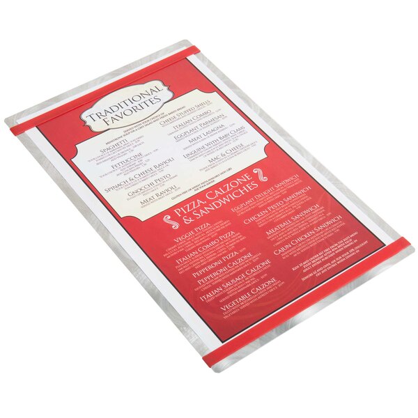 A Menu Solutions Alumitique menu board with red and white writing on a table in a restaurant.