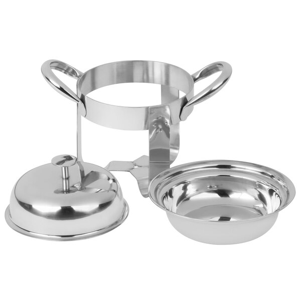 A silver metal Libbey chafing dish with a bowl inside.