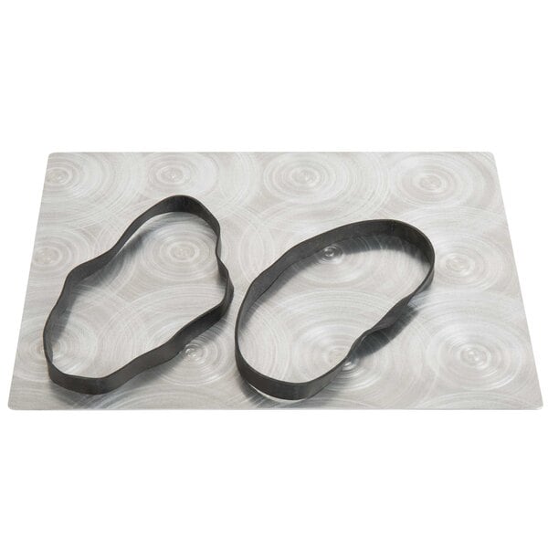 A white customizable aluminum menu board with black rubber bands.