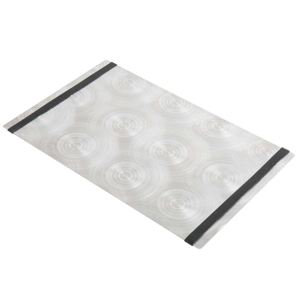 A white rectangular aluminum menu board with black swirls and bands.