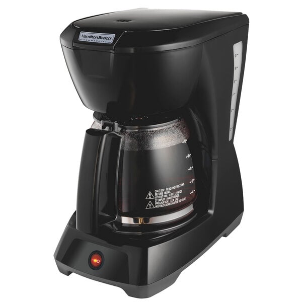 A black Hamilton Beach coffee maker with a glass pot.
