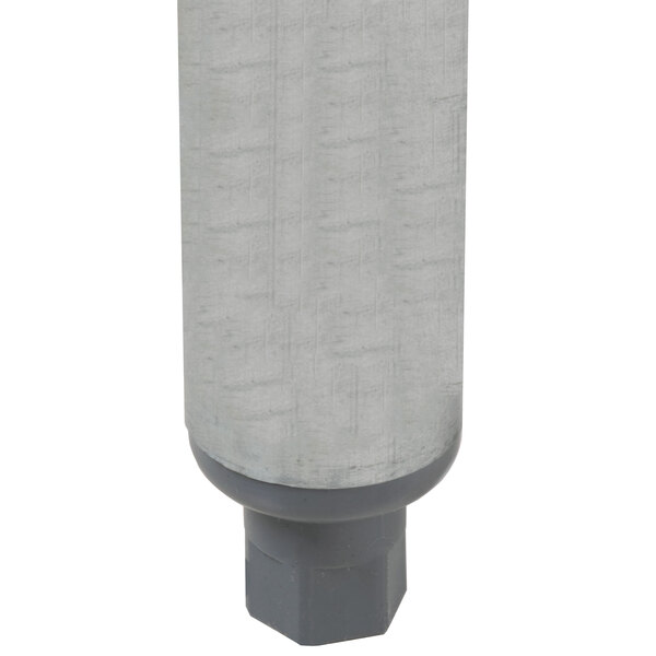 An Advance Tabco stainless steel utility sink with a grey cylindrical filter.