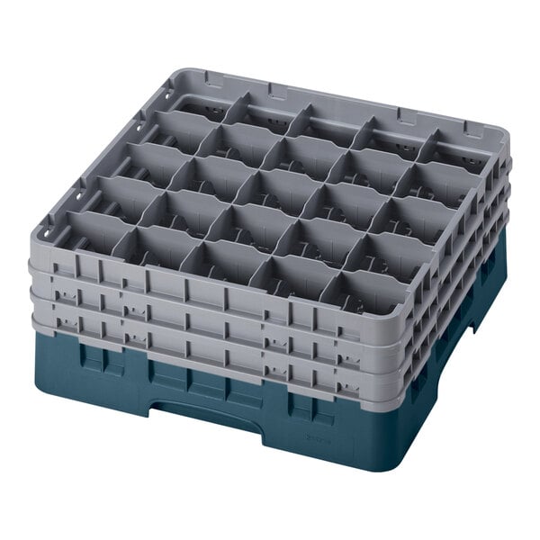 A teal plastic Cambro glass rack with compartments and extenders.