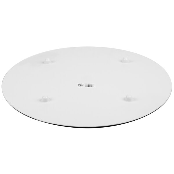 A white round American Metalcraft melamine serving board.