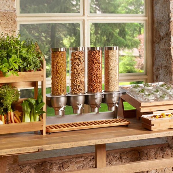 A Rosseto cereal dispenser on a wooden table.