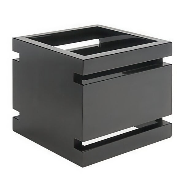 A black square multi-level riser with cut out edges.