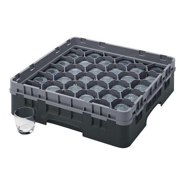 A black plastic Cambro glass rack with many glasses inside.