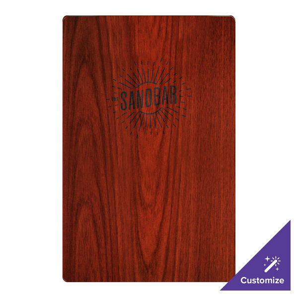 A Mahogany wood menu board with picture corners on a table with a menu inserted.