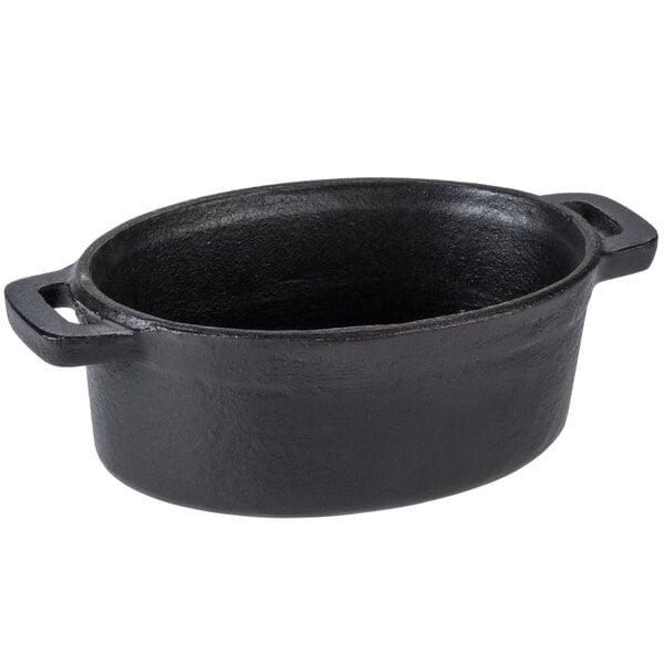 A case of 12 Libbey black cast iron oval dishes.