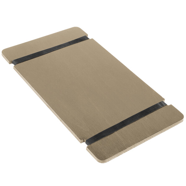 A wood board with black bands on a brown surface.