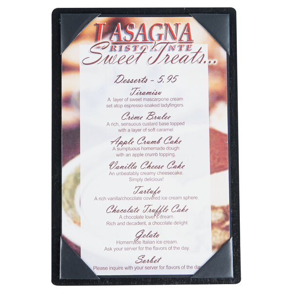 A black Menu Solutions wood board with picture corners on a table with a dessert menu.
