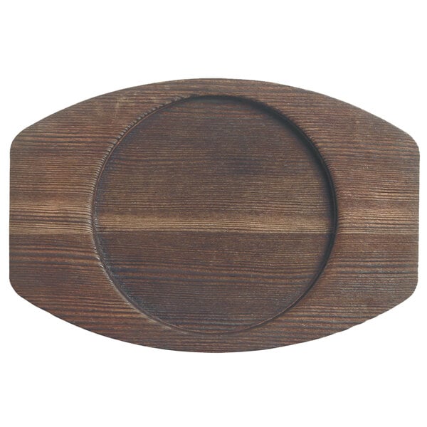 A wooden surface with an oval shaped Libbey cedar plank underliner.