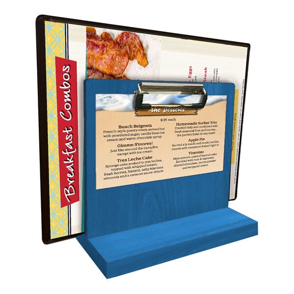 A blue wood tabletop menu caddy with a metal clip for holding menus or signs.